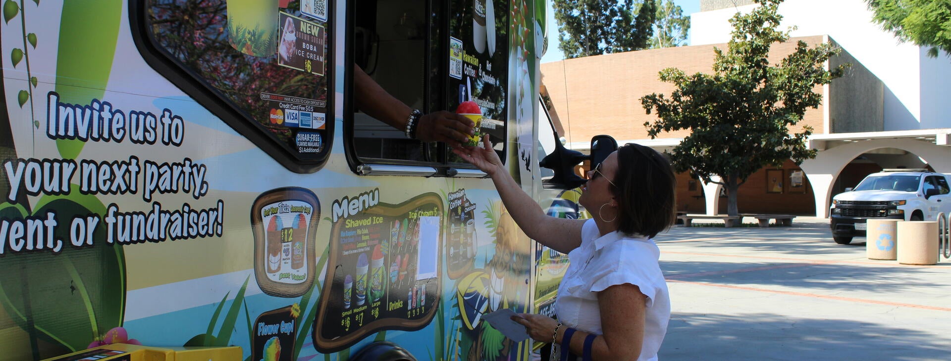 attendee grabbing shaved ice at 2025 CPF
