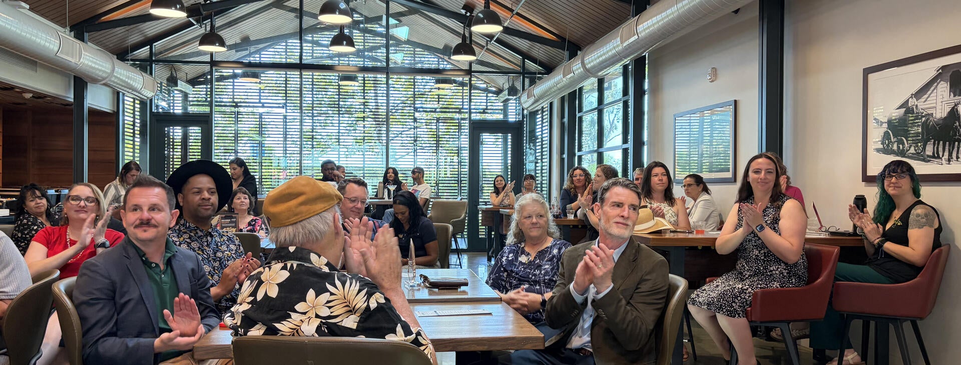 2026 Outstanding Staff Awards attendees clapping.