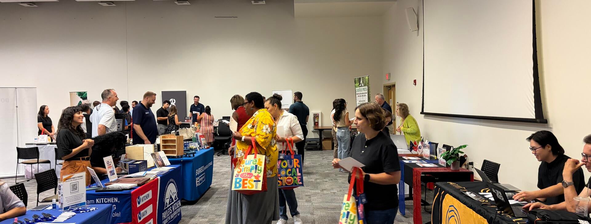 Community Partner Fair 2026 booths and attendees.