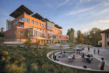 School of Business Building at UC Riverside, a building surrounded by student activity